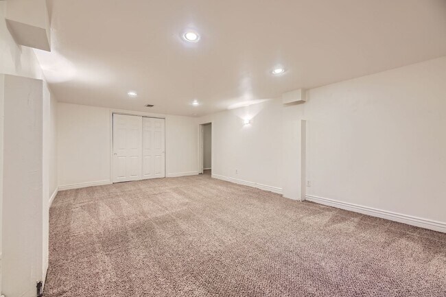 Building Photo - Spacious Home w/Large Backyard Only Blocks...