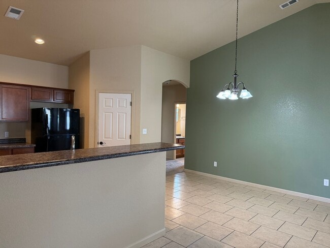 Building Photo - Beautiful 4 bedroom, 2 bath, 3 car garage ...