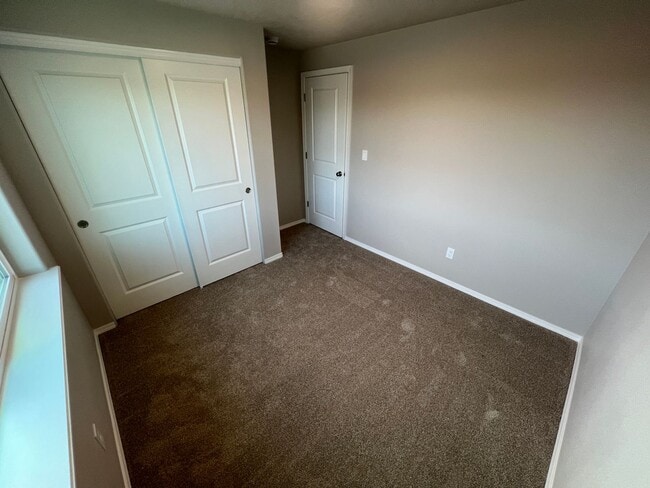 Building Photo - NEW Modern Townhouse with Two Car Garage i...