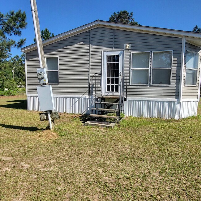 Building Photo - 710 Blue Bird Dr
