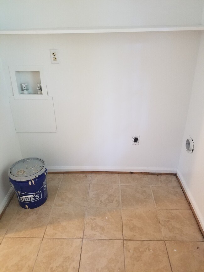 Building Photo - Three Bedroom Brick Home Walking Distance ...