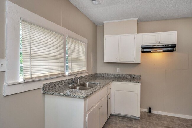 Building Photo - RARE 4BR Bessemer Beauty – Huge Space, Modern Updates & Low Move-In Costs!