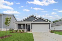 Building Photo - New 4BR Home in Whispering Woods – Spaciou...