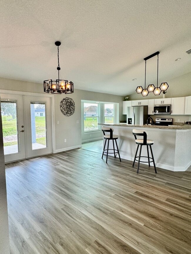 Building Photo - Stunning Brand-New 3BR/2BA Bushnell Block ...