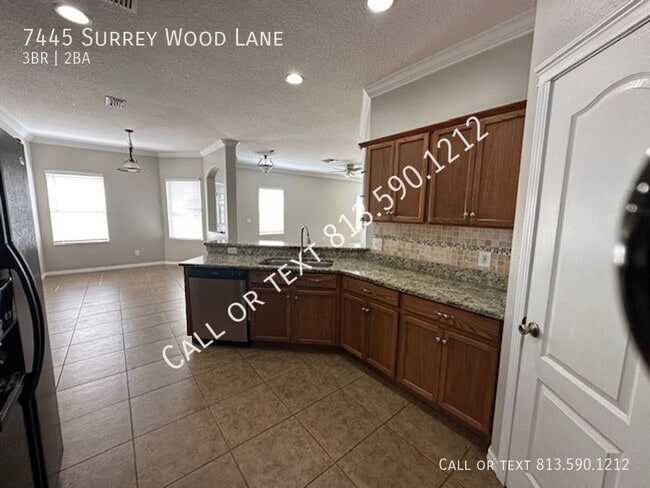 Building Photo - 7445 Surrey Wood Ln