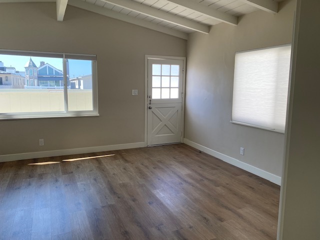 Living room looking out over deck and 30th Street. - 210 30th St