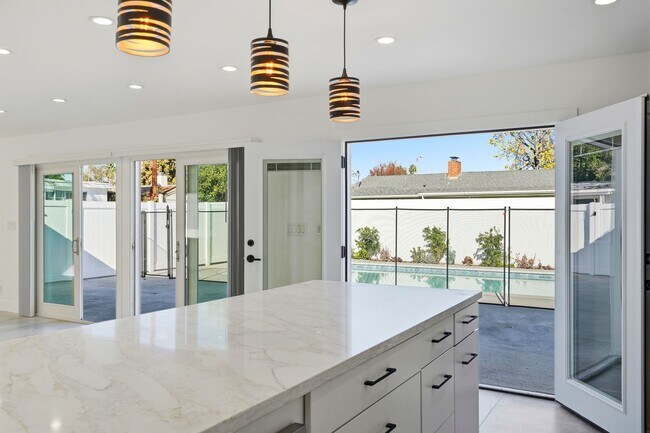 Building Photo - Newly Rebuilt Luxury 3 Bed Home with Pool, Designer Kitchen, Huge Courtyard, Near Topanga Mall