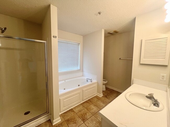 Building Photo - Freshly Painted! New Luxury Vinyl Plank Fl...