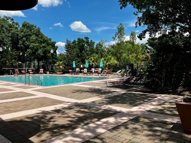 Building Photo - MOVE IN NOW!! Gated community Miriada! 1st floor 1X1.5 bath condo near pool area!!! Laminate wood...