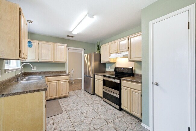 Building Photo - Updated home on a corner lot in a gated community!