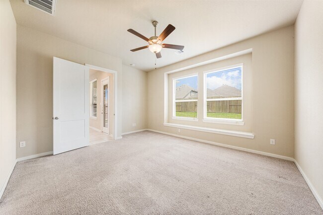 Building Photo - 8714 Windsong Trail Dr