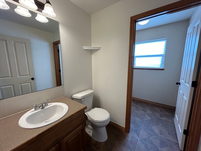 Building Photo - Spacious 5-Bedroom Home with Finished Basement and 3-Car Garage in Wellington