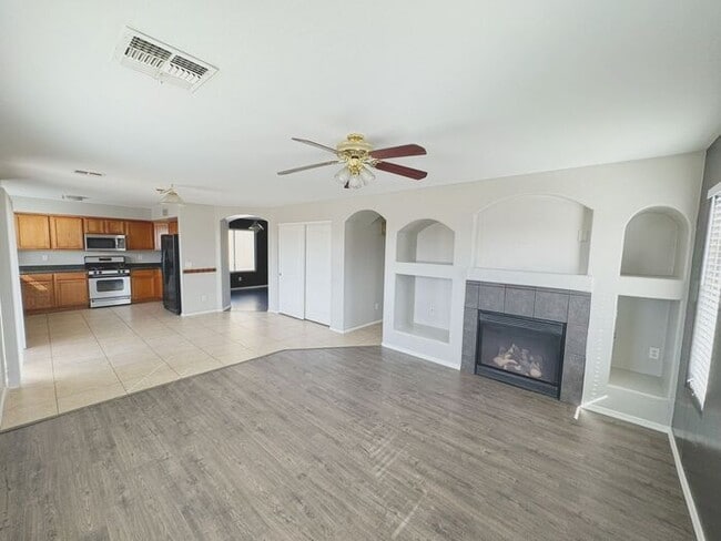 Building Photo - 4BR / 2.5BA Home with Expansive Lot – 2-Car Garage, Community Pools & Golf