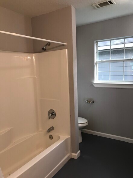 Main restroom with washer and dryer - 222 S Kansas Ave