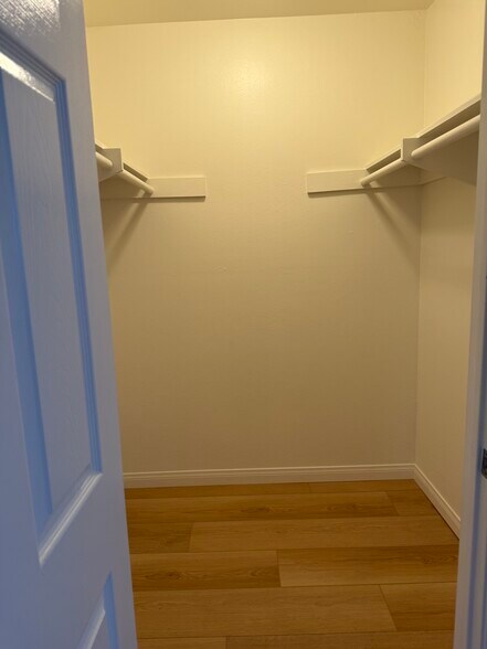 Walk in closet in primary bedroom - 4475 Dale Ave