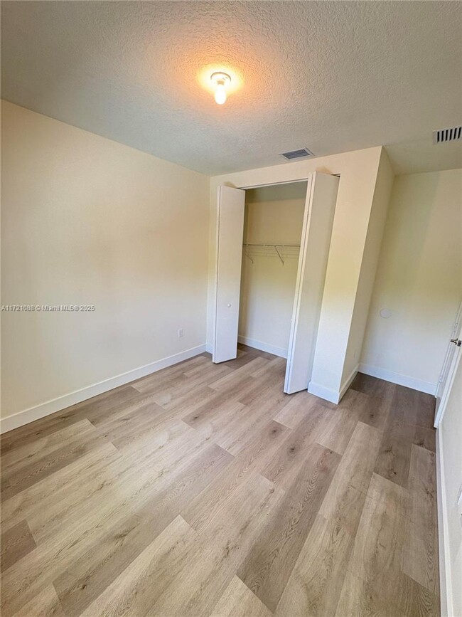 Building Photo - 6450 NW 102nd Ct
