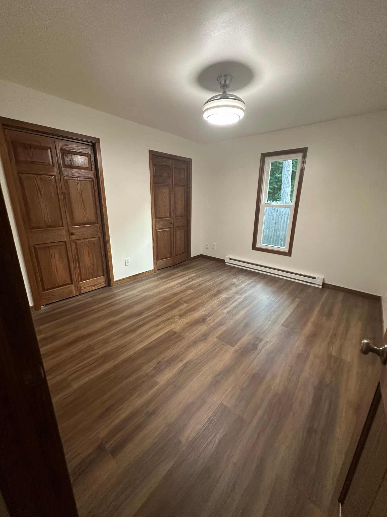 Bedroom 1 with double closet - 5705 Moyer Ave