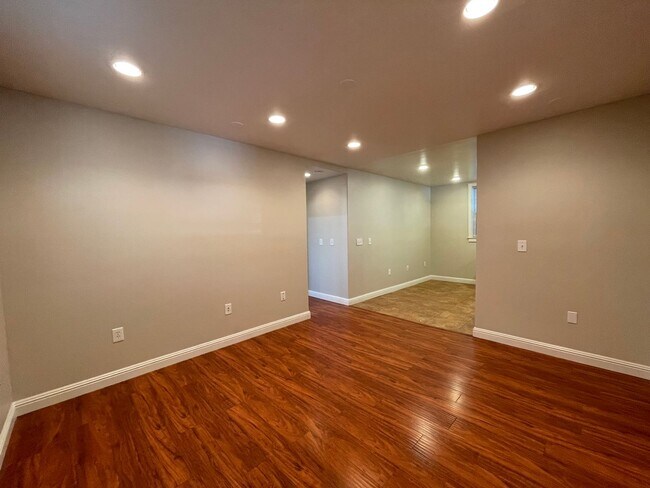 Building Photo - 2 Car Garage Included! Downstairs 2 Bed 2 Full Bath AND Washer and Dryer!