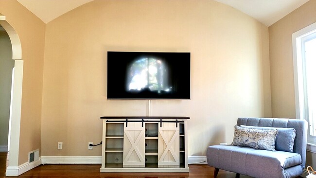 65” TV in living room - 1350 Curson S Ave