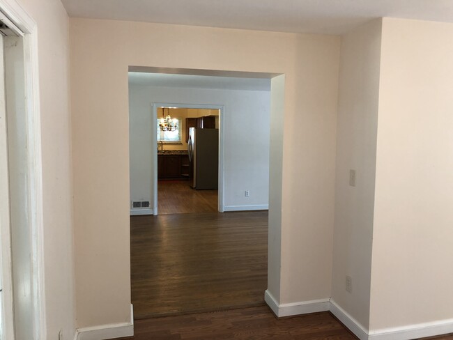 Living room and kitchen view from dining room - 3805 jonesbridge road