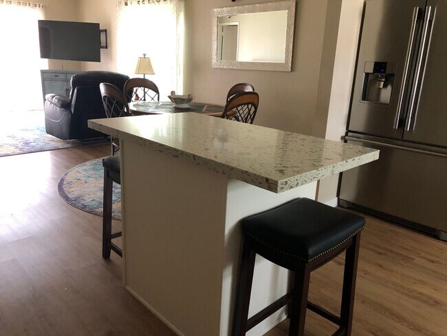 Building Photo - Welcome to this stunning 1-bedroom, 1.5-bathroom home located in Leisure World a 45+ Active Adult...