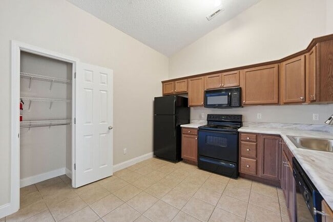 Building Photo - Single-Level Apartment Homes with Attached Private Garages – No Upstairs Neighbors