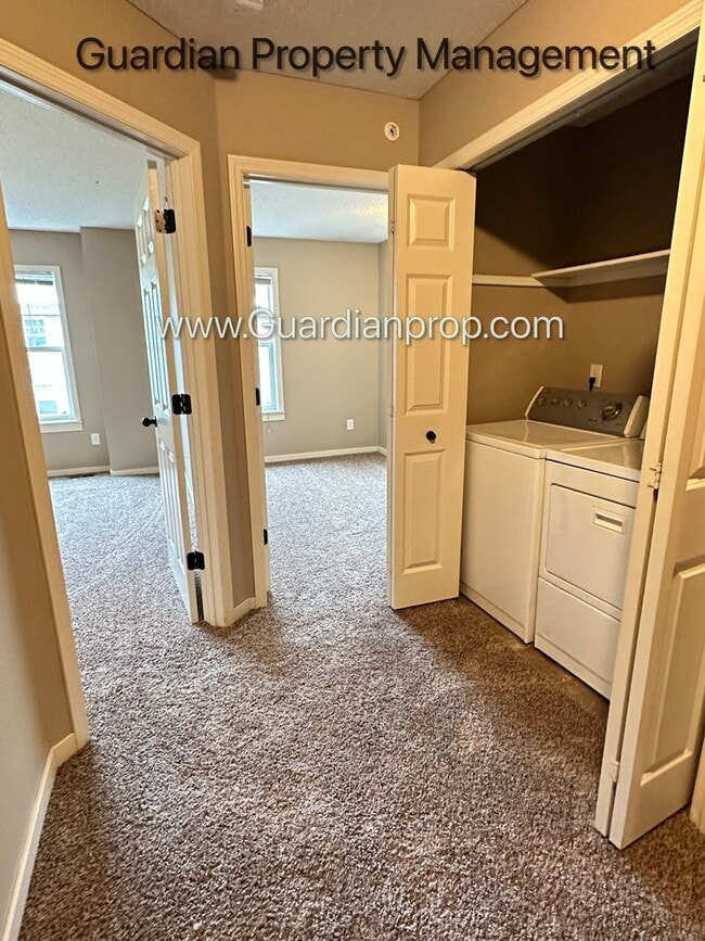 Building Photo - Champlin Town Home, 2 Car Garage, Dishwasher, Washer/Dryer, Balcony, July/Aug 1st Move In