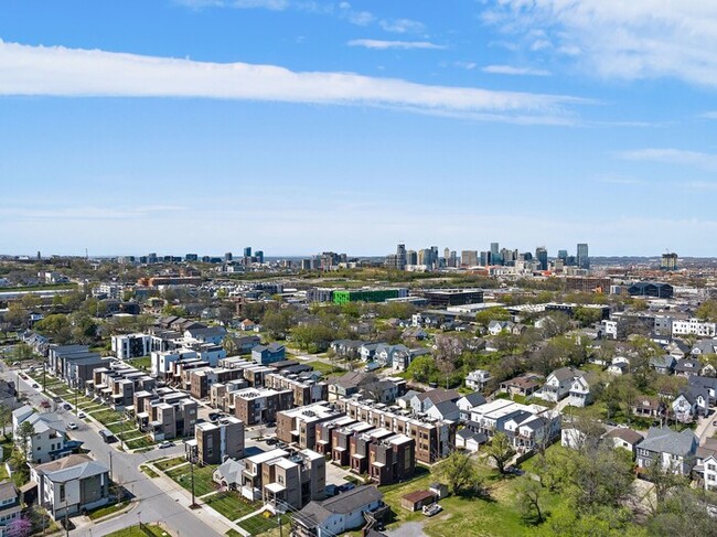 Building Photo - Luxury Brick Home with Rooftop Deck in Vib...