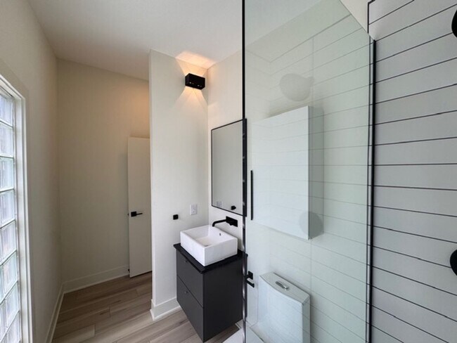Building Photo - Vaulted Ceilings & Hardwood Floors in This Charming Indianapolis L