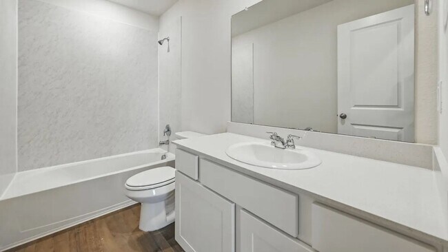 Building Photo - Beautiful new 4-bedroom, 2-bath home with an open floor plan, granite kitchen, two-car garage, an...