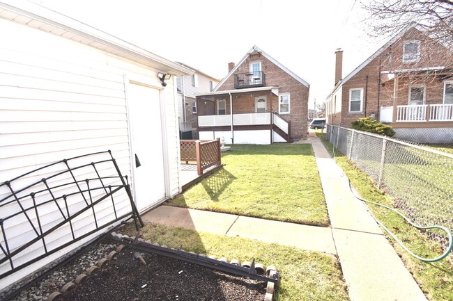 Building Photo - 3855 N Nora Ave