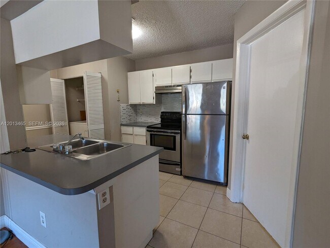 Building Photo - 18308 NW 68th Ave