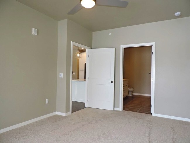 Building Photo - LUXURY CONDO - AVAILABLE NOW - MOVE IN PROMO