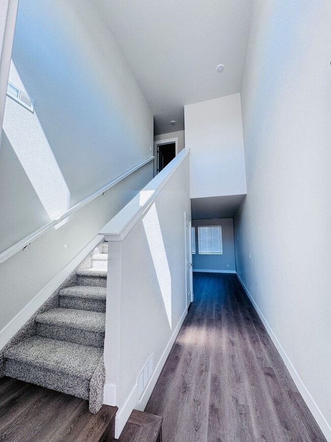 Building Photo - Sage Meadows II Townhomes — Lakeside Living Meets Modern Comfort!