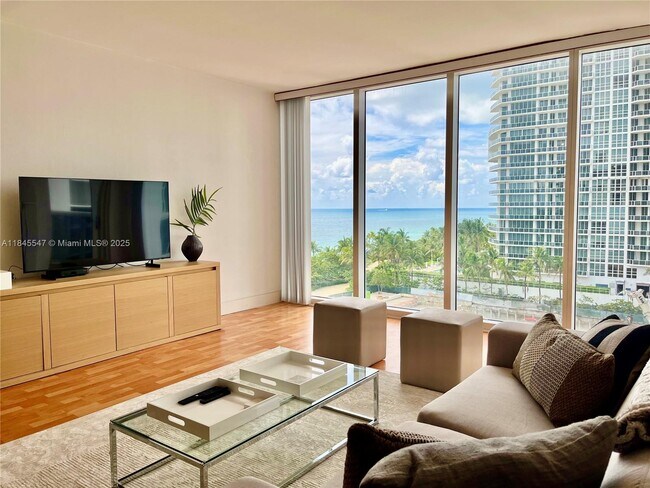 Building Photo - 10275 Collins Ave
