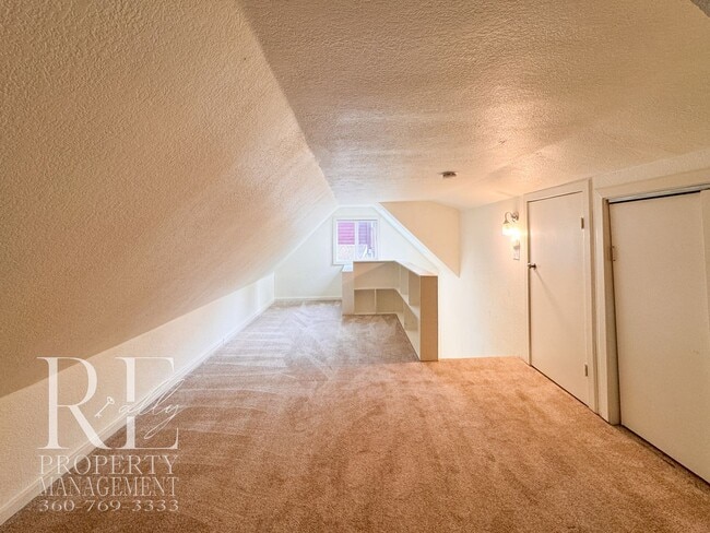 Building Photo - Private Retreat with Expansive Yard & Loft Space