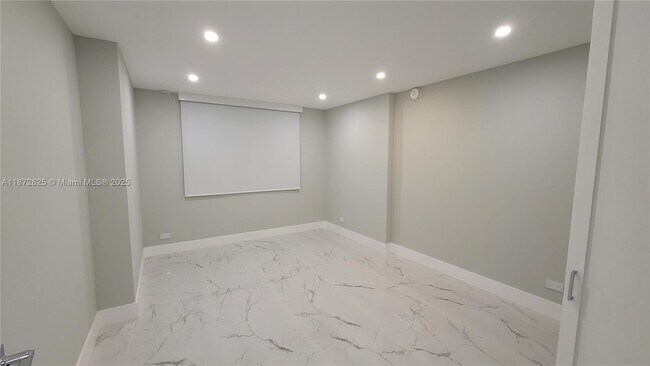 Building Photo - 6039 Collins Ave