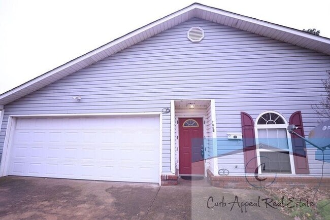 Building Photo - First month move in special $900!! Beautiful 3-bed, 2 bath condo with 2-car garage - includes was...