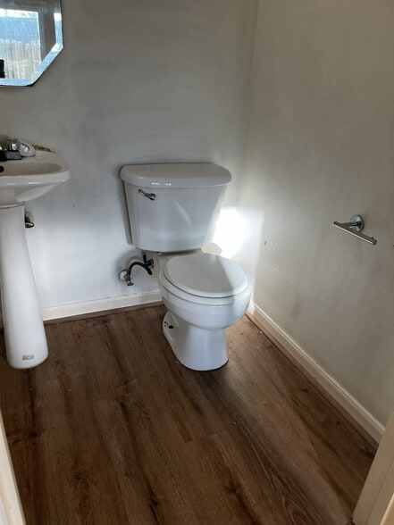 downstairs half bath - 11807 Chetman Dr