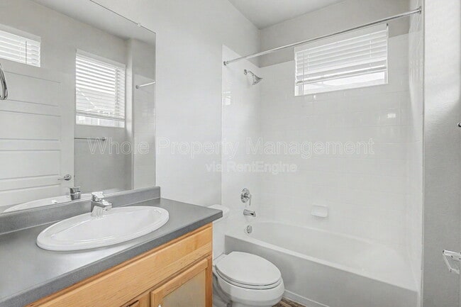 Building Photo - 9985 E 59th Ave