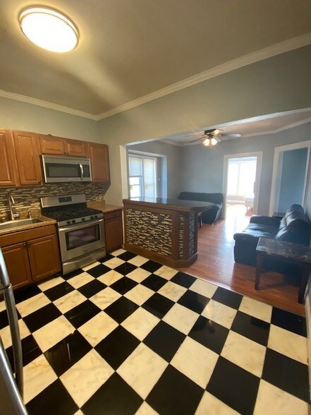 kitchen, living room from back of apartment - 109 Lexington Ave