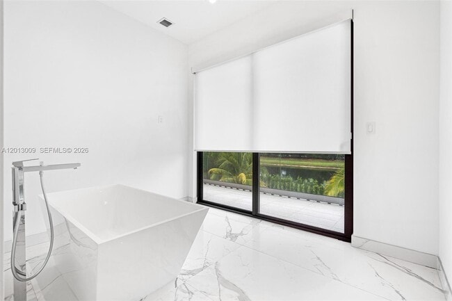 Building Photo - 16529 Botaniko Dr N