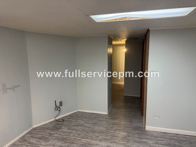 Building Photo - Lower basement studio unit in a house