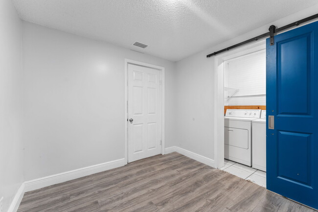 BEDROOM 2 & LAUNDRY ROOM - 7513 N Cortez St