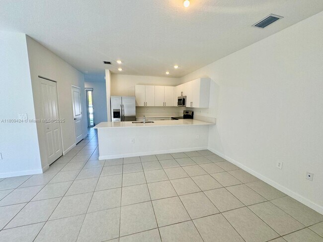 Building Photo - 26459 SW 149th Ave