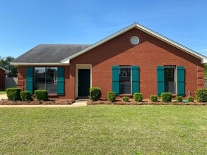 Building Photo - Charming 3-Bedroom Brick Home with Modern ...