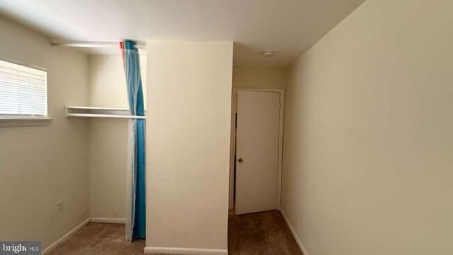 Building Photo - 8103 Greenspring Way