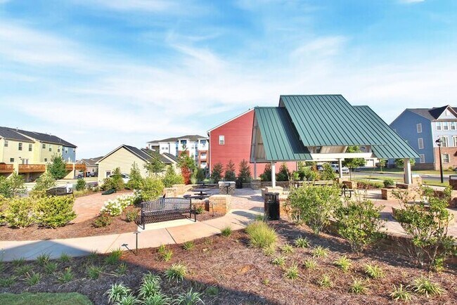 Building Photo - Stunning 3 Story 3BD/2+2HalfBA Townhome in...