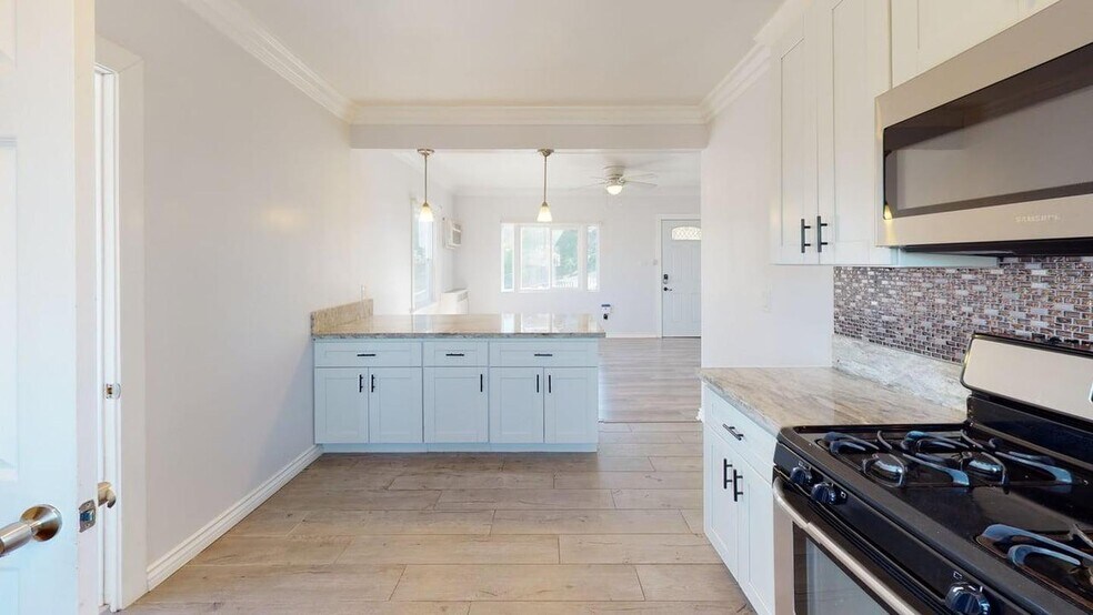 Building Photo - Modern & Spacious Home in East LA – Great Value and Prime Location!