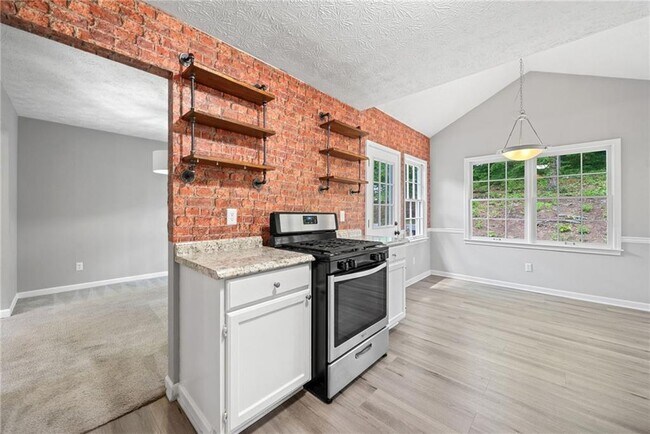Building Photo - 5590 Princeton Oaks Dr